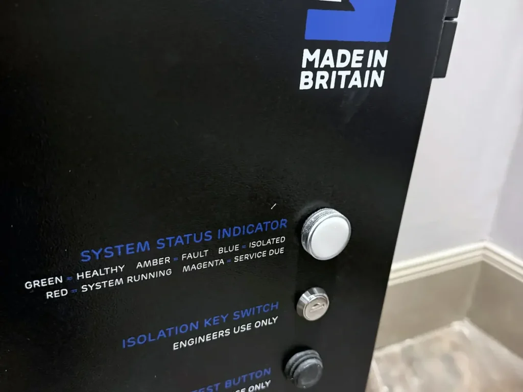 Water mist system control panel showing the status indicator, isolation key switch and test button